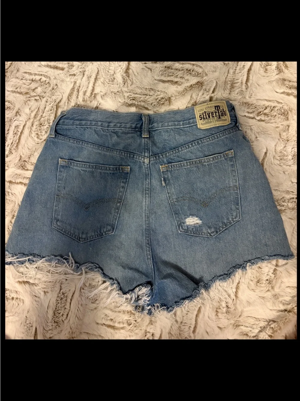 Levi's Light Blue Distressed Denim Shorts